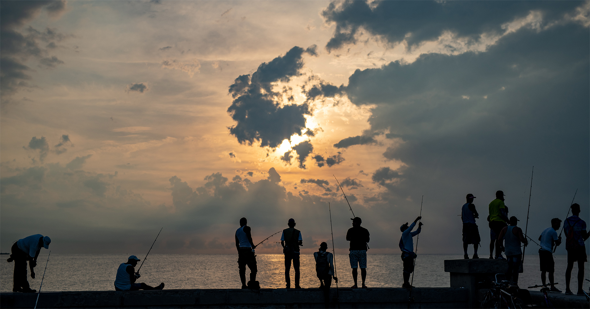'Fishers along the Malecón' by Diego Javier Luis Every day fishers gather at the Castillo de San Salvador de la Punta to cast their lines.